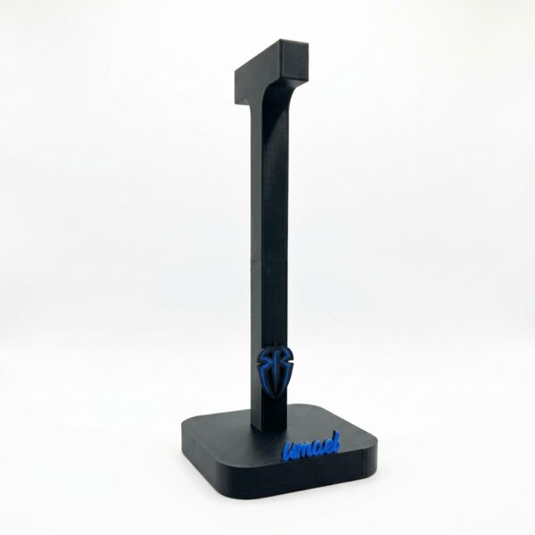Gemini_Generated_Image_dolgjedolgjedolg.png_20260924154140 Soporte para Audífonos Personalizado – Negro Mate con Relieve 3D