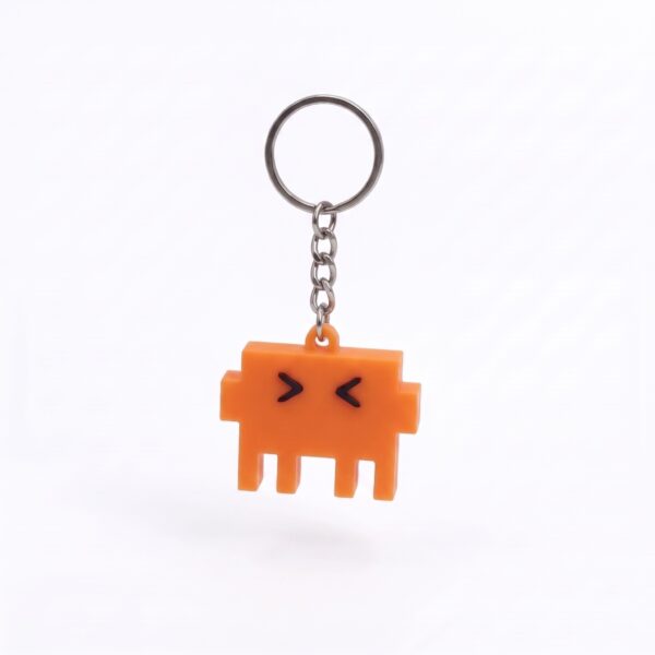 keychanClaude Llavero Retro Pixel Alien – Space Invaders 8-Bits